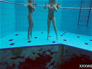 molten Russian femmes swimming in the pool